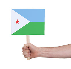 Image showing Hand holding small card - Flag of Djibouti