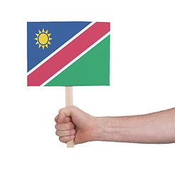 Image showing Hand holding small card - Flag of Namibia