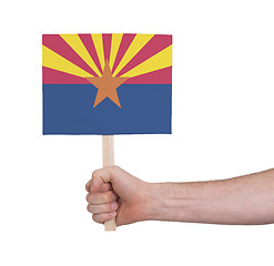 Image showing Hand holding small card - Flag of Arizona