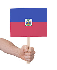 Image showing Hand holding small card - Flag of Haiti