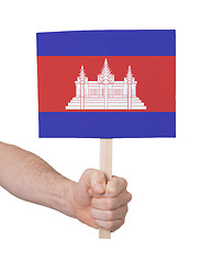 Image showing Hand holding small card - Flag of Cambodia