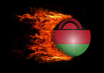 Image showing Flag with a trail of fire - Malawi