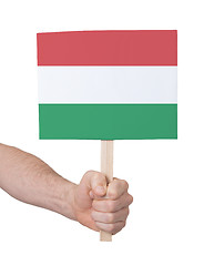 Image showing Hand holding small card - Flag of Hungary