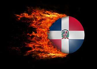 Image showing Flag with a trail of fire - Dominican Republic