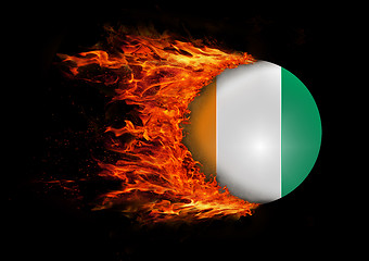 Image showing Flag with a trail of fire - Ivory Coast