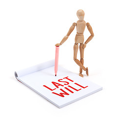 Image showing Wooden mannequin writing - Last will