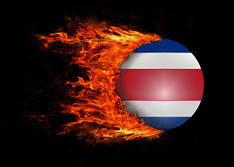 Image showing Flag with a trail of fire - Costa Rica