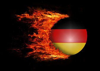 Image showing Flag with a trail of fire - Germany