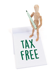 Image showing Wooden mannequin writing - Tax free