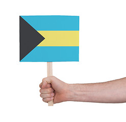 Image showing Hand holding small card - Flag of Bahamas