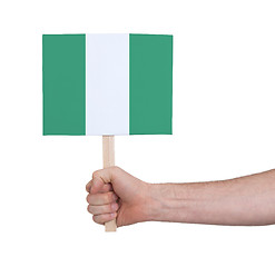 Image showing Hand holding small card - Flag of Nigeria