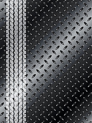 Image showing Industrial background with truck tyre on black metallic mesh