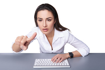 Image showing Business woman pointing at imaginary button