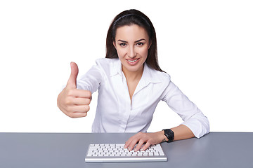 Image showing Happy smiling businesswoman with thumb up