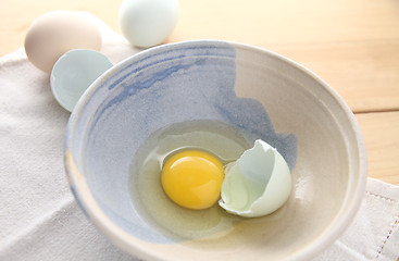 Image showing broken Araucana egg in a decorative bowl