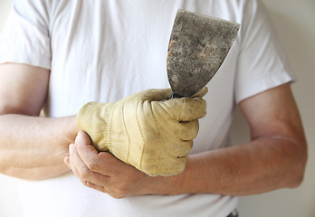 Image showing man working with a painful wrist	