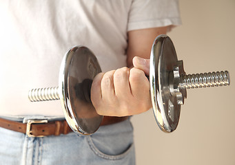 Image showing man holding weight	