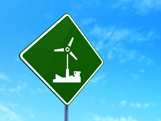 Image showing Industry concept: Windmill on road sign background