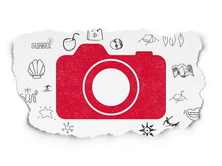 Image showing Vacation concept: Photo Camera on Torn Paper background