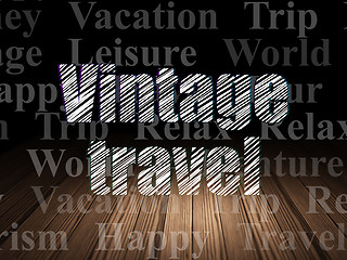 Image showing Vacation concept: Vintage Travel in grunge dark room