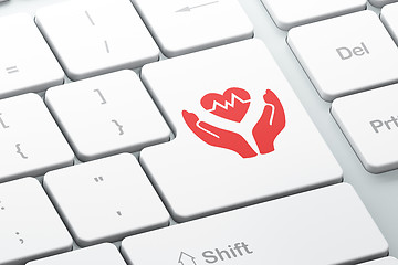 Image showing Insurance concept: Heart And Palm on computer keyboard background