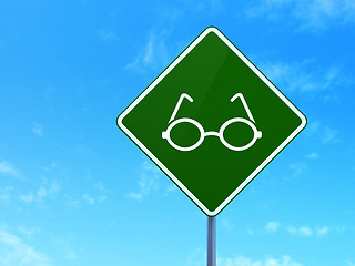 Image showing Science concept: Glasses on road sign background
