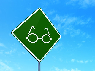 Image showing Science concept: Glasses on road sign background
