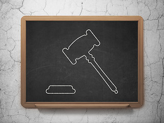 Image showing Law concept: Gavel on chalkboard background