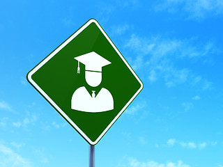 Image showing Science concept: Student on road sign background