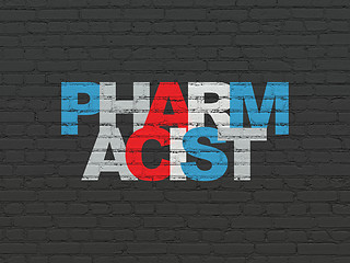 Image showing Health concept: Pharmacist on wall background