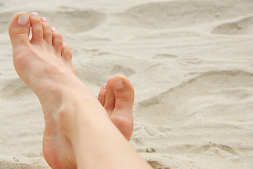 Image showing Woman feet beach