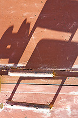 Image showing metal rusty  brown    morocco in red  wood   safe padlock 