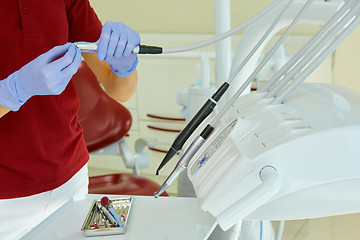 Image showing hands of dentist