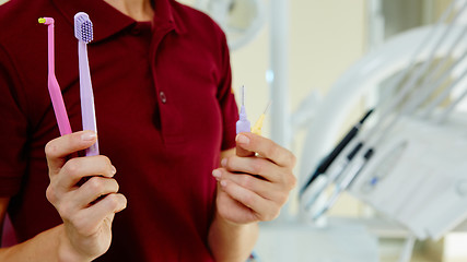 Image showing hands of dentist