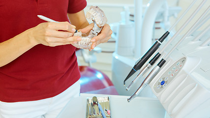 Image showing hands of dentist