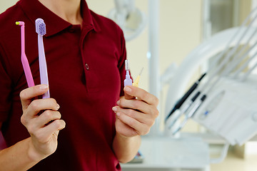 Image showing hands of dentist