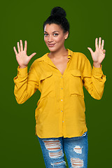 Image showing Woman showing nine fingers