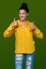 Image showing Woman showing thumbs up