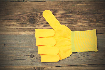 Image showing gloves with raised thumb up