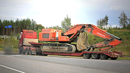 Image showing Volvo FH16 Hauls Hitachi Zaxis Excavator