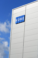 Image showing KONE Building with Signage and Blue Sky Clouds, Vertical