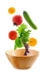 Image showing Fresh vegetables falling