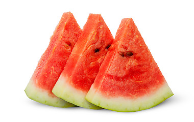 Image showing In front threel slices of watermelon stacked ladder