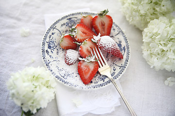 Image showing sugared strawberries with hydrangeas