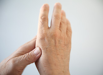 Image showing man with aching hand