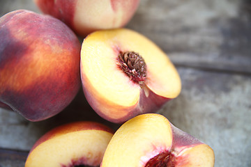 Image showing peaches, halves and whole