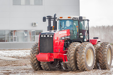 Image showing Test-drive of tractor on special dirt range