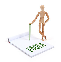 Image showing Wooden mannequin writing - Ebola