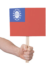 Image showing Hand holding small card - Flag of Myanmar