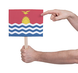 Image showing Hand holding small card - Flag of Kiribati